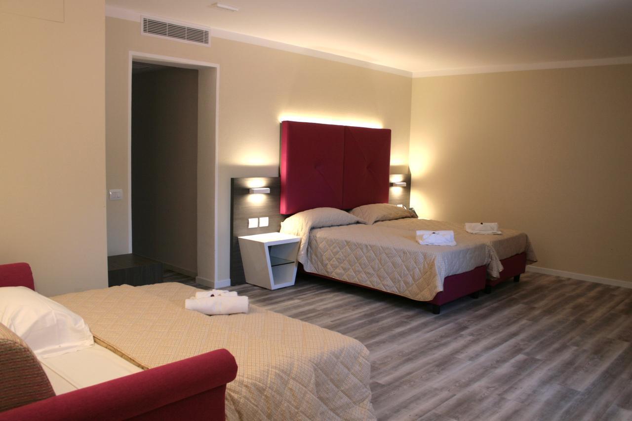Alma Living Hotel- Al Girarrosto Венцоне Экстерьер фото